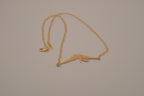 Horizontal flying bird necklace