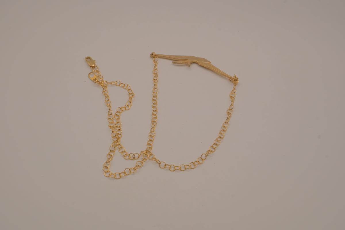 Horizontal flying bird necklace