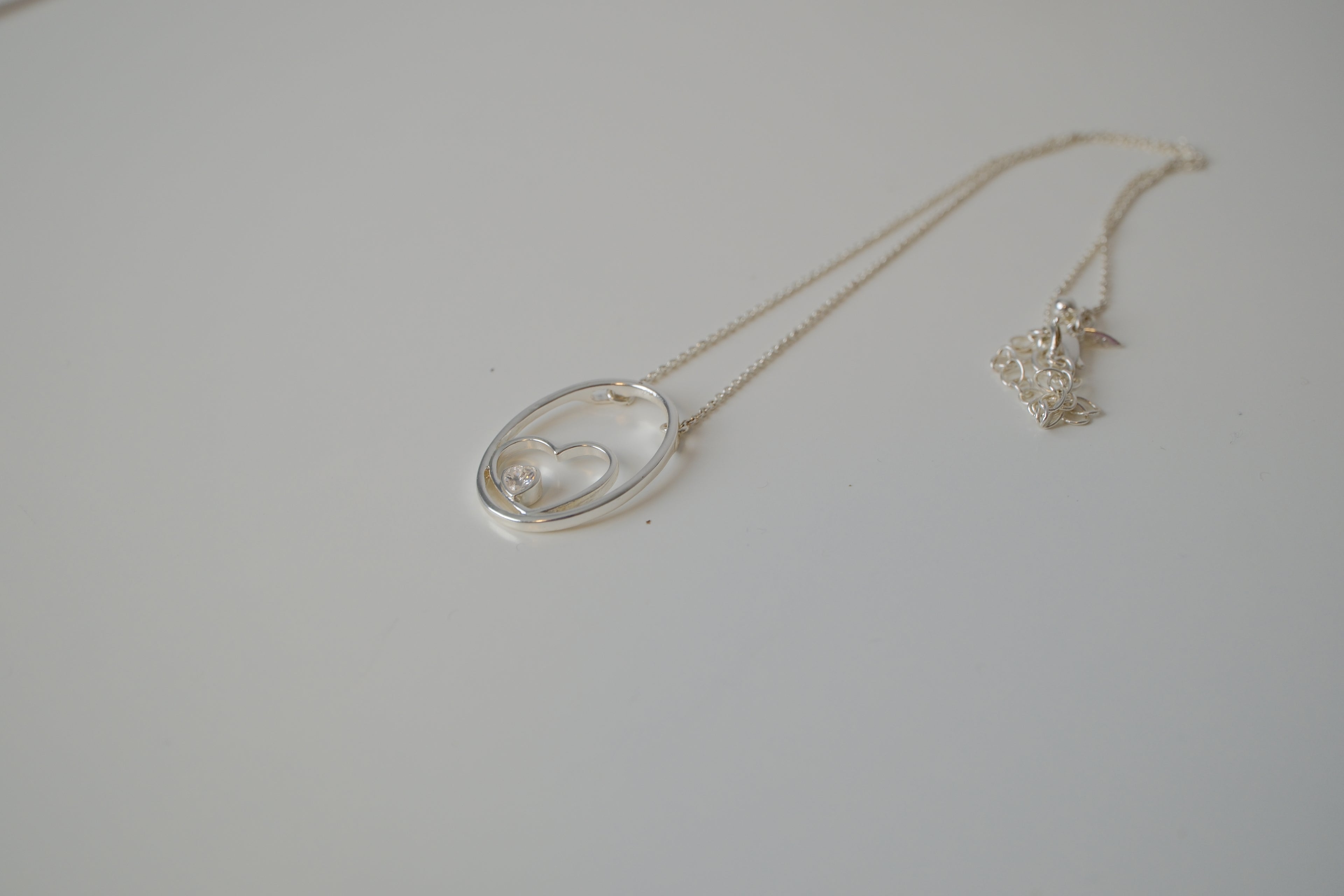 Floating heart pendant necklace