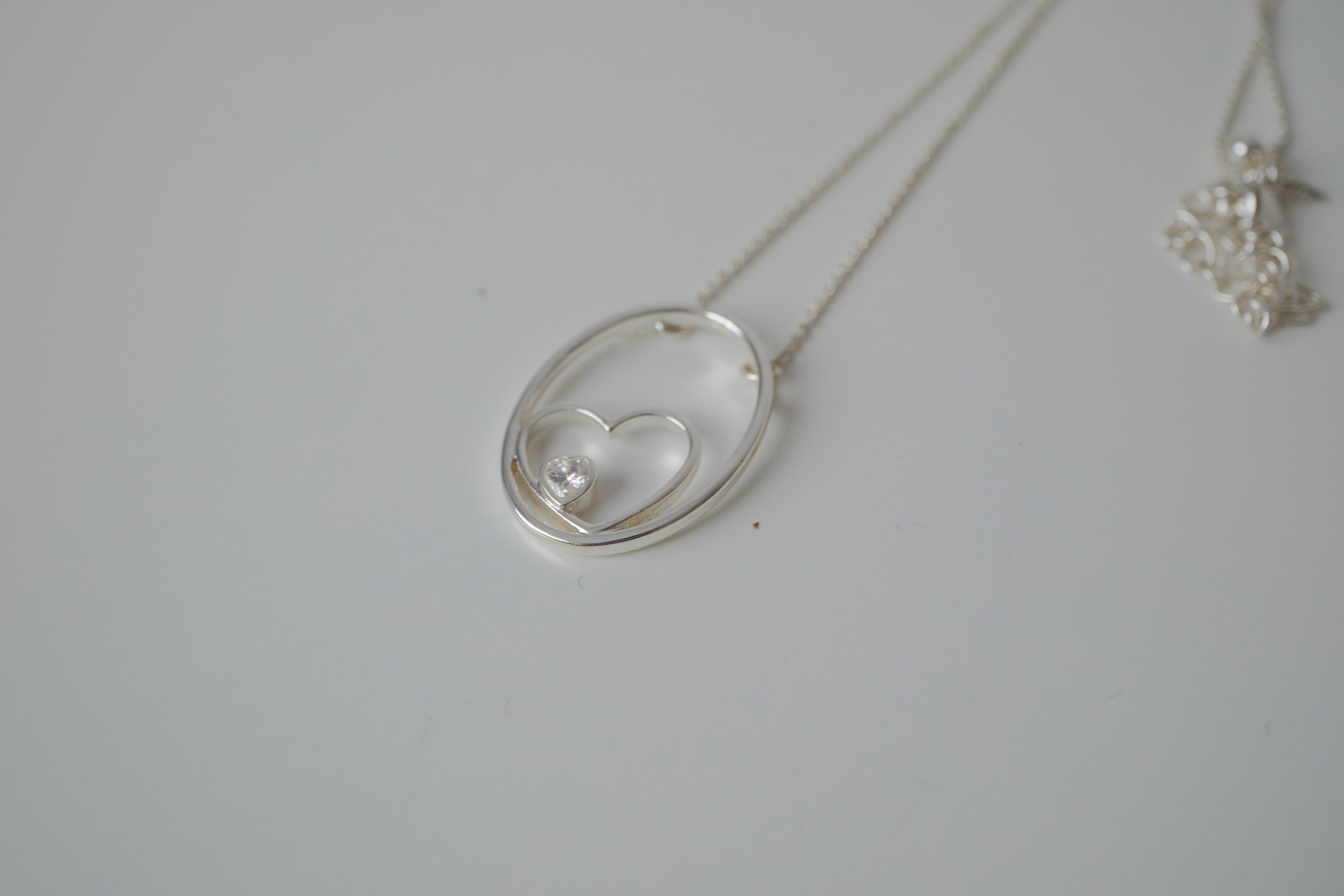 Floating heart pendant necklace