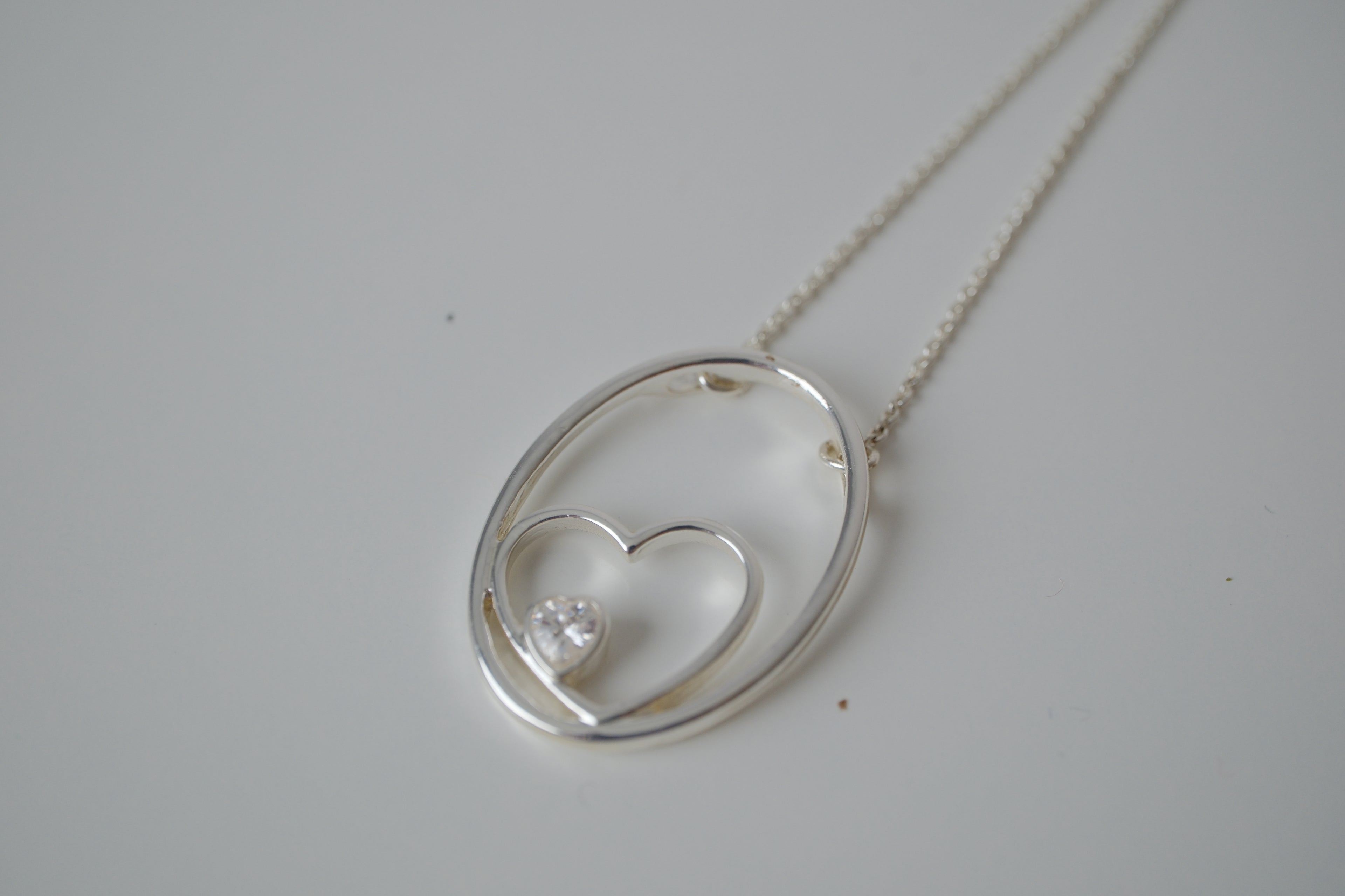 Floating heart pendant necklace