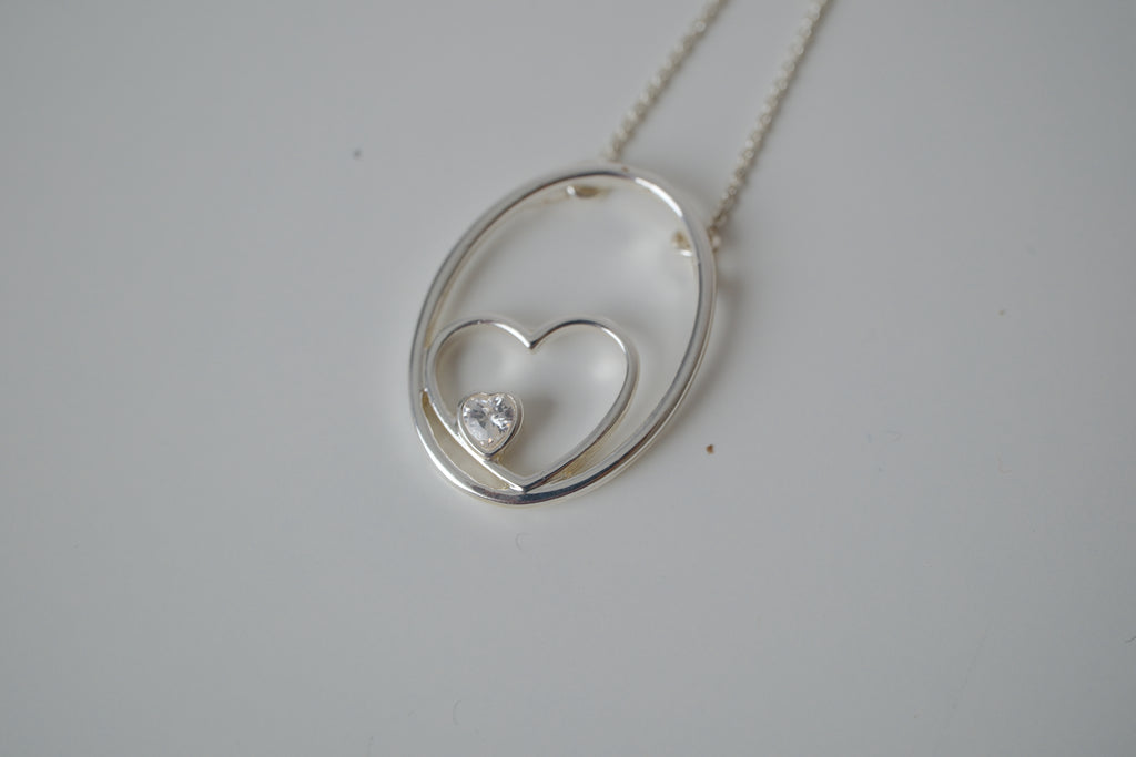 Floating heart pendant necklace