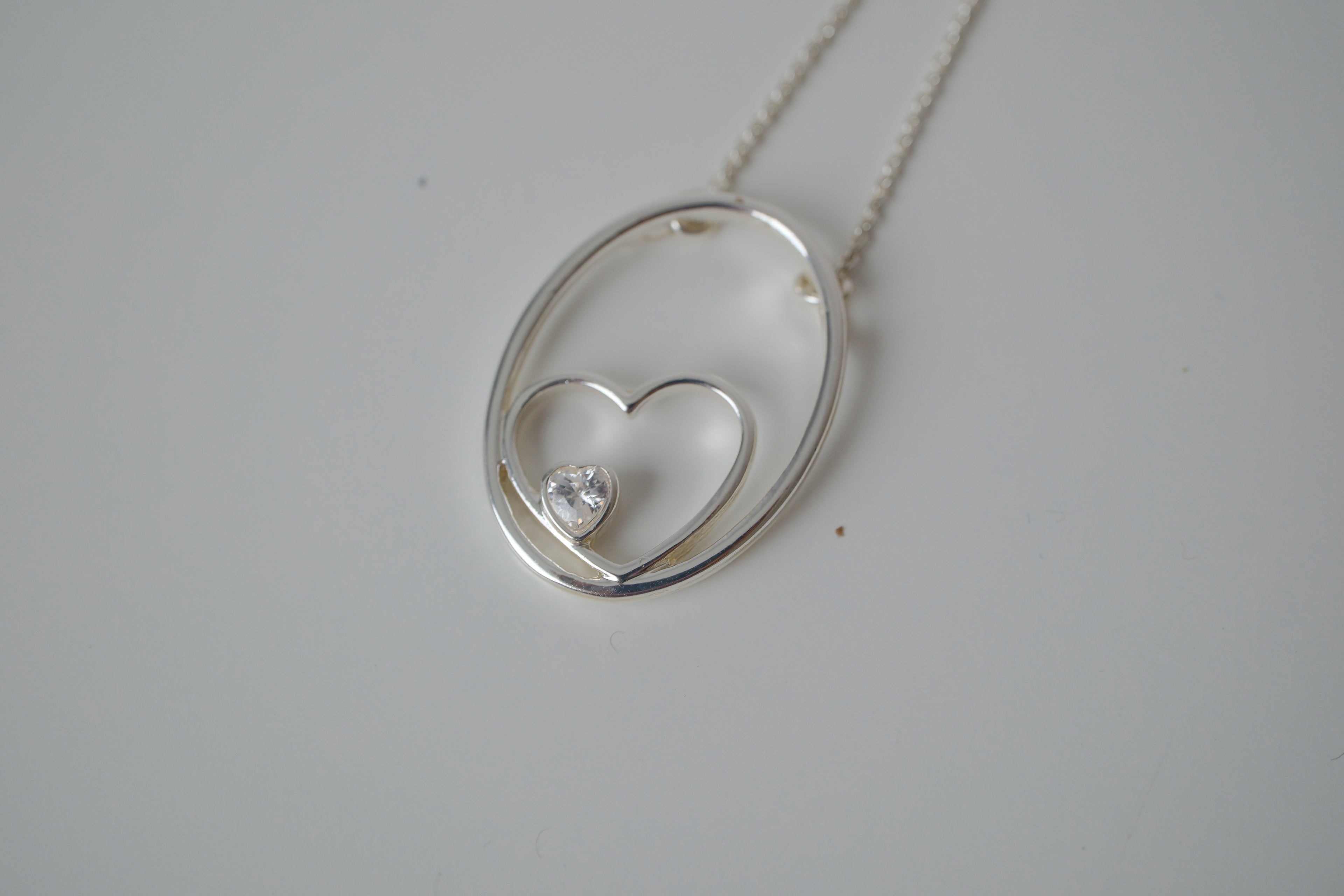 Floating heart pendant necklace