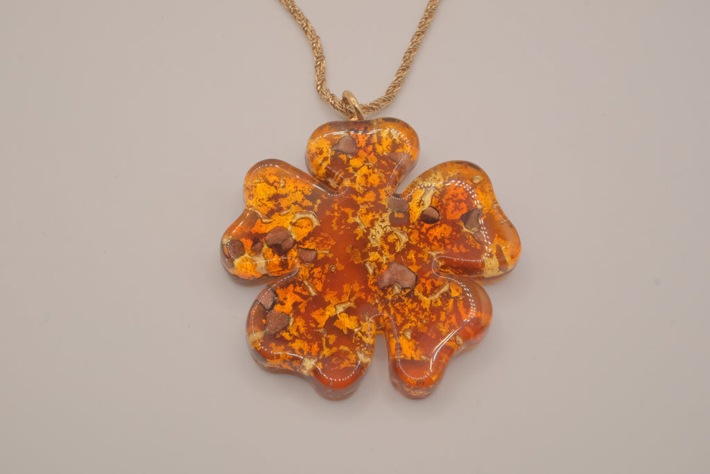 Vintage four-leaf clover pendant on Sarah Cov chain