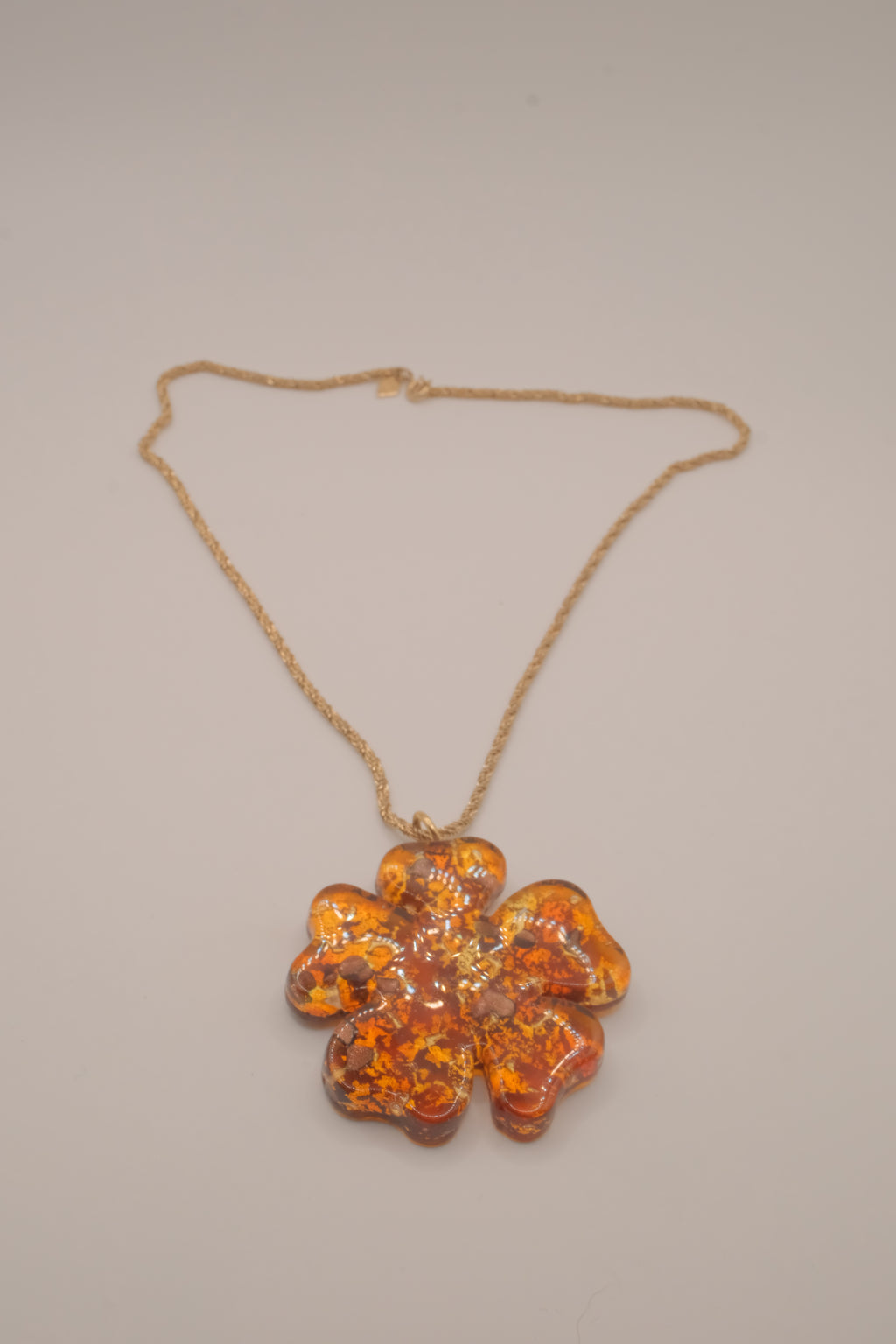Vintage four-leaf clover pendant on Sarah Cov chain