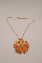 Vintage four-leaf clover pendant on Sarah Cov chain