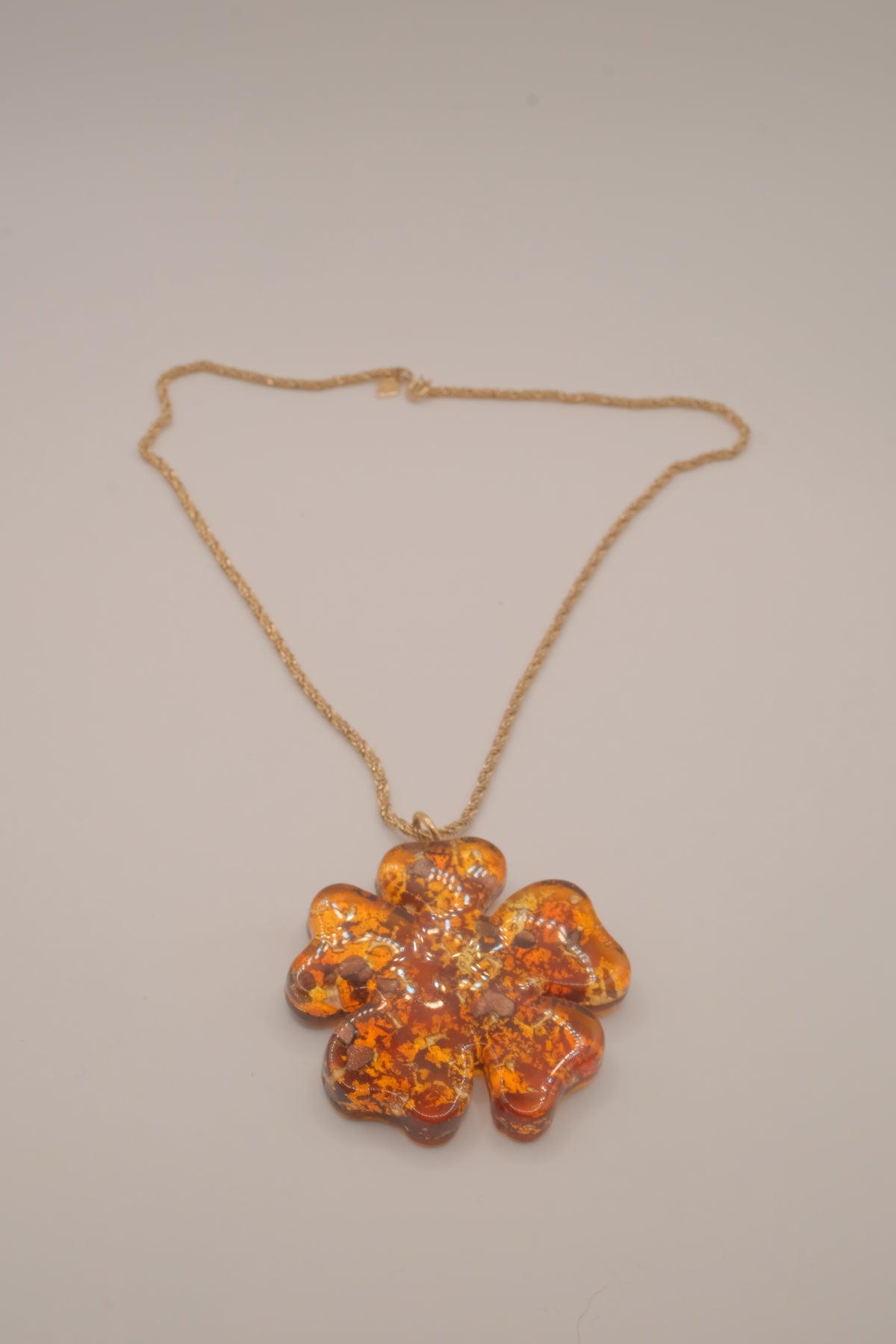 Vintage four-leaf clover pendant on Sarah Cov chain