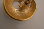 Vintage black enamel and gold-tone swirl button earrings
