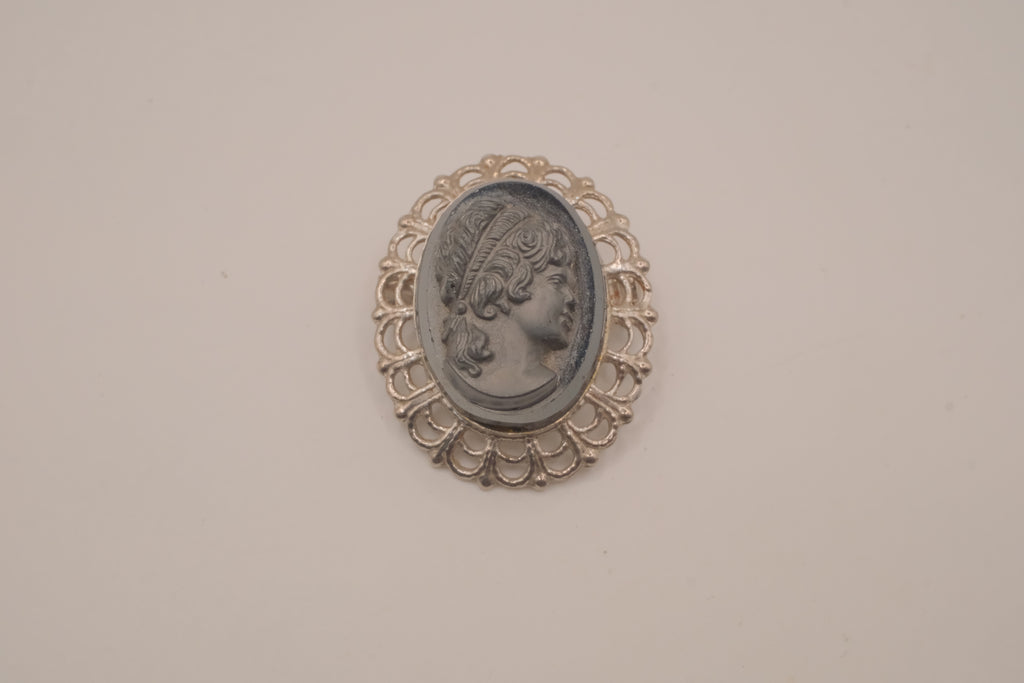 Vintage neoclassical hematite glass cameo brooch