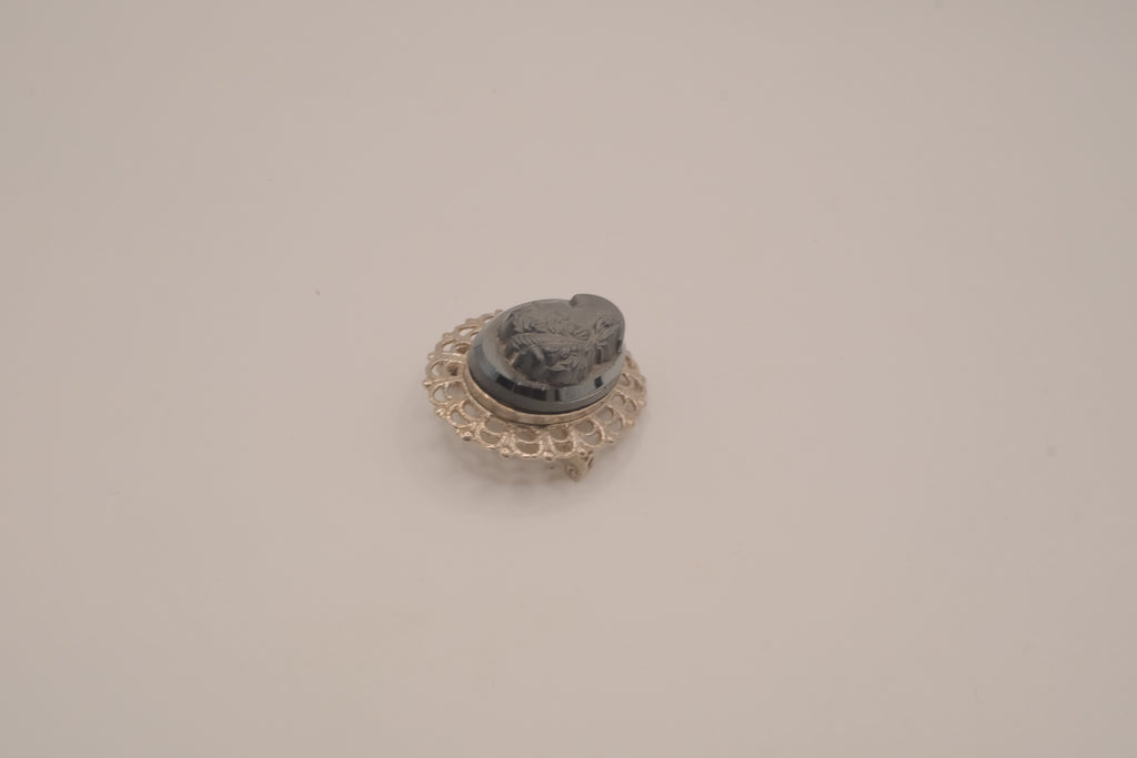 Vintage neoclassical hematite glass cameo brooch