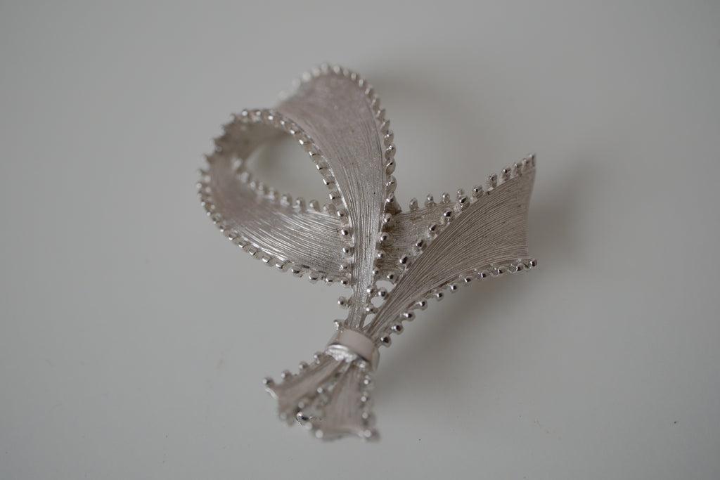 Vintage silver-tone ribbon brooch