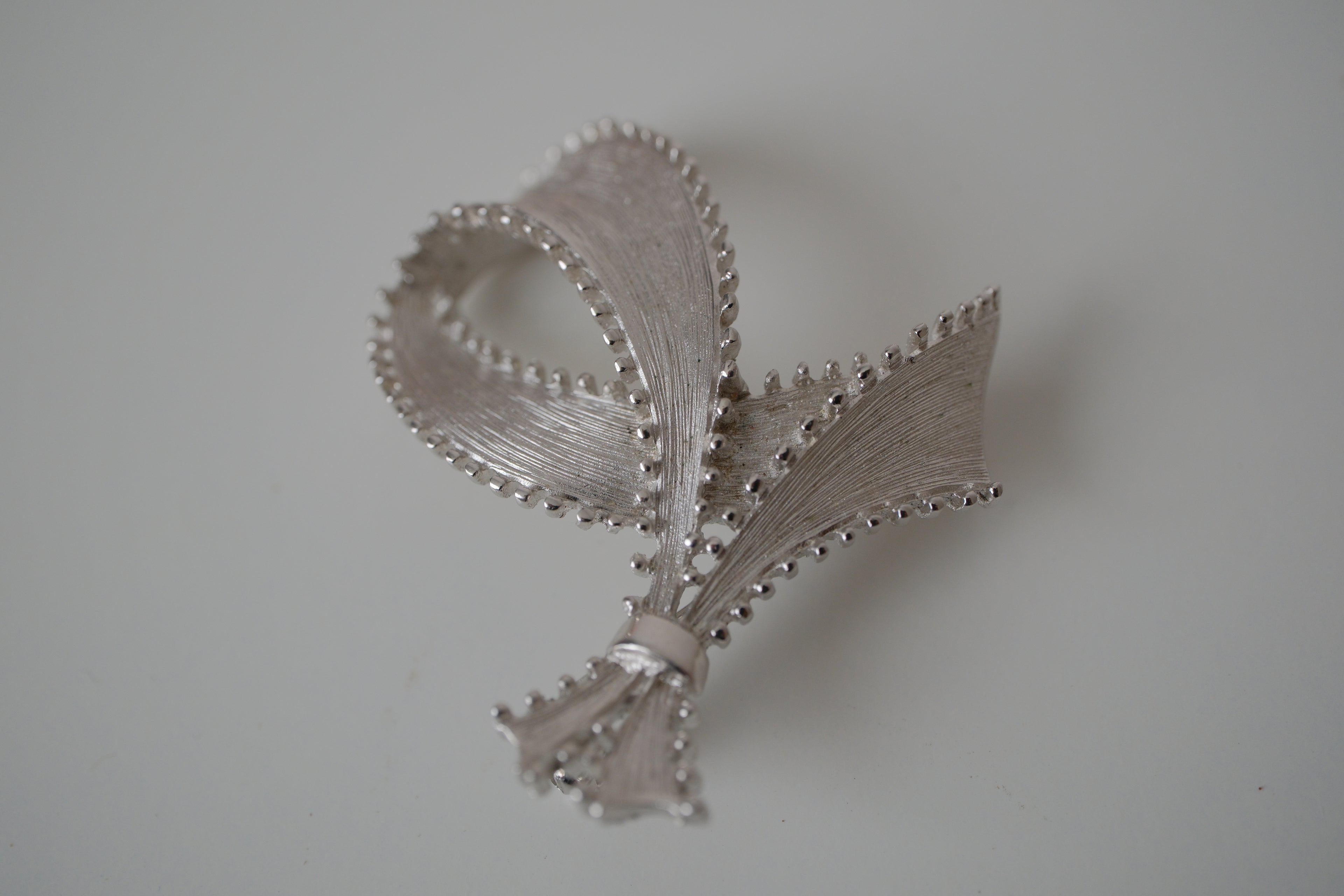 Vintage silver-tone ribbon brooch
