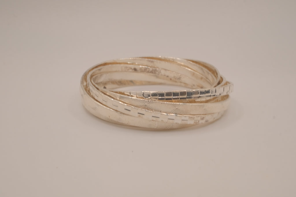 Silver tone rolling bangle bracelet