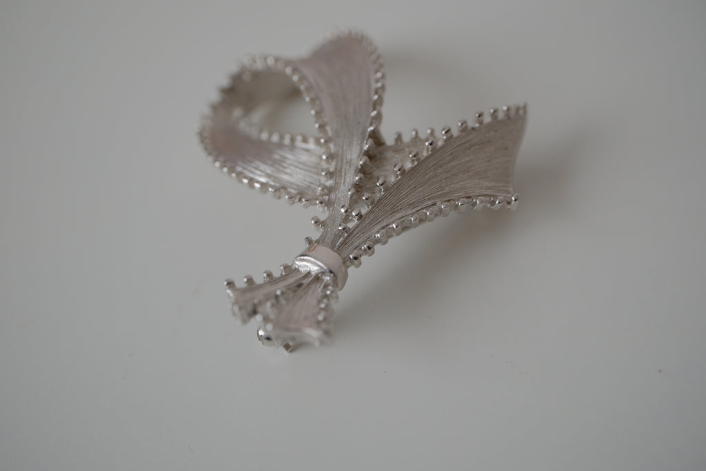 Vintage silver-tone ribbon brooch