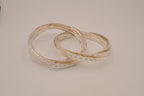Silver tone rolling bangle bracelet