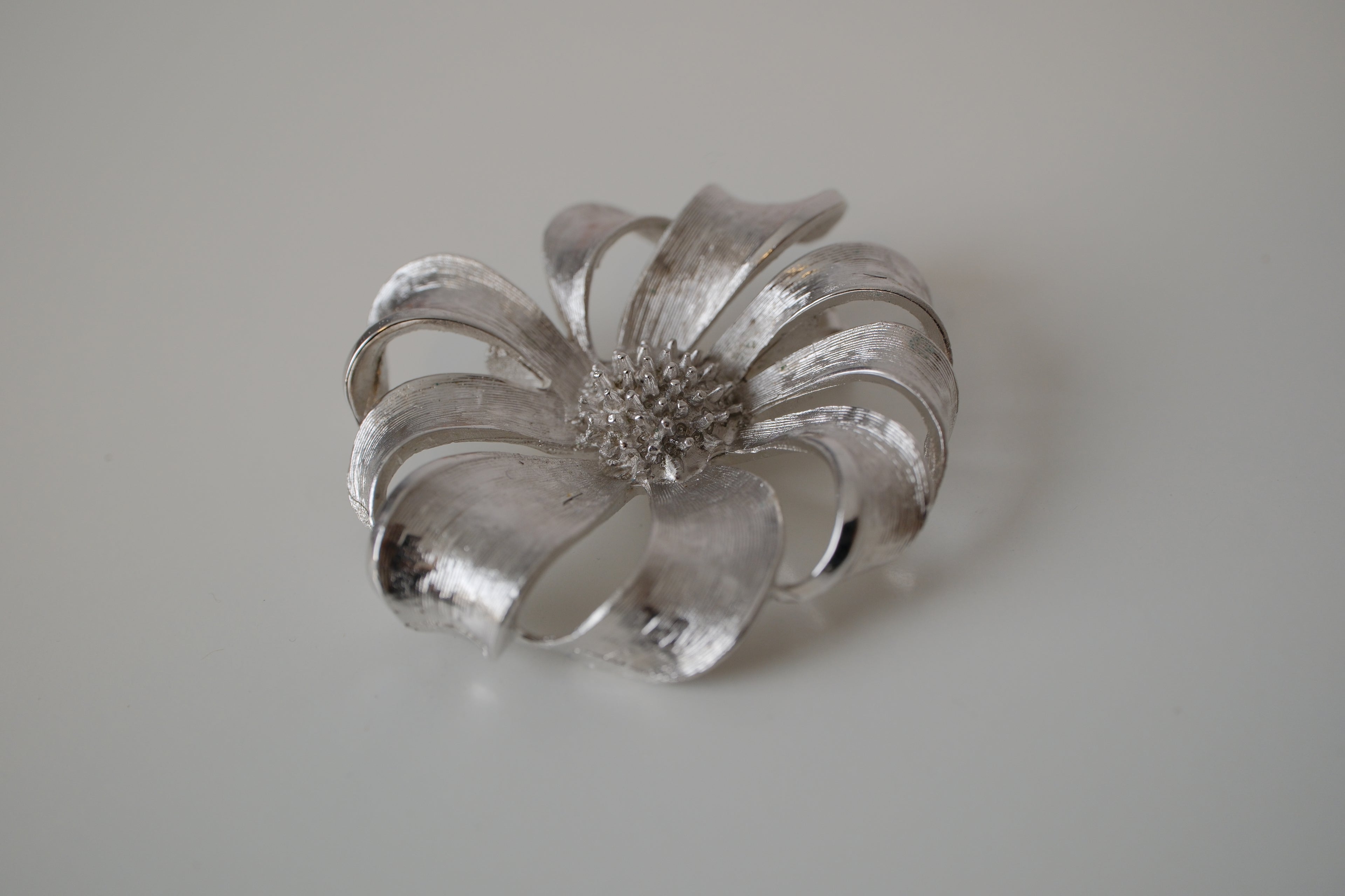 Vintage Coro silver-tone flower brooch