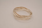 Silver tone rolling bangle bracelet
