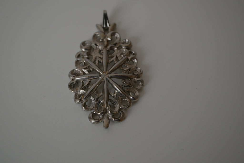 Intricate filigree openwork pendant