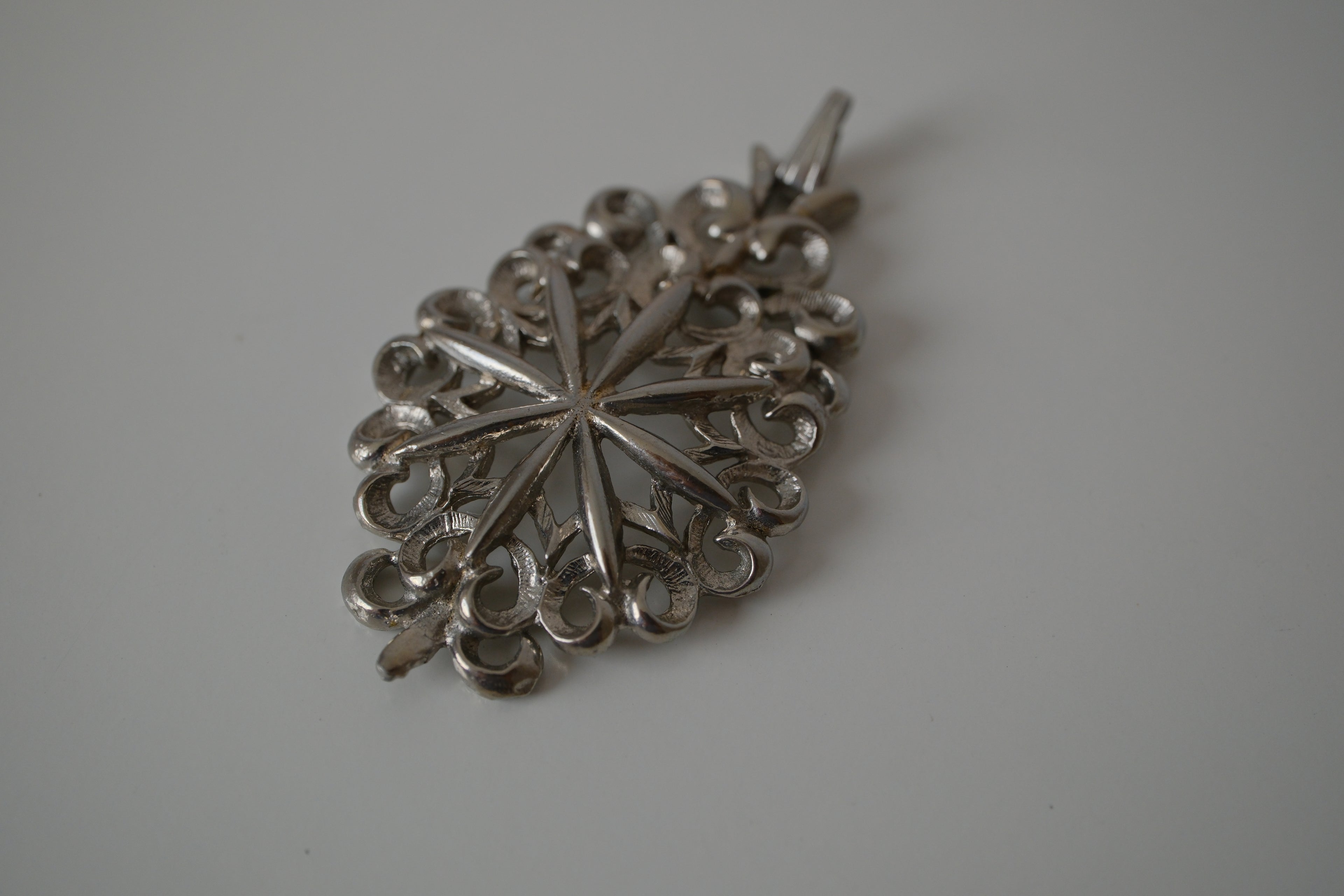 Intricate filigree openwork pendant