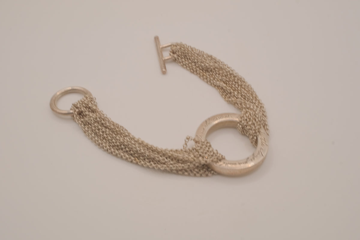Multi-strand chain quote bracelet