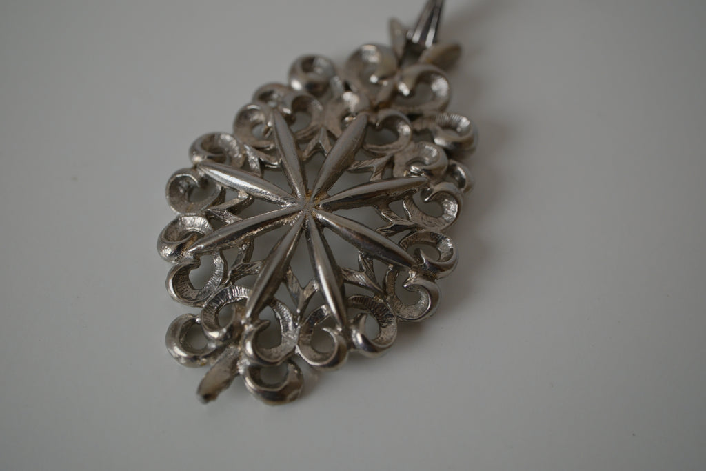 Intricate filigree openwork pendant