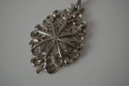 Intricate filigree openwork pendant