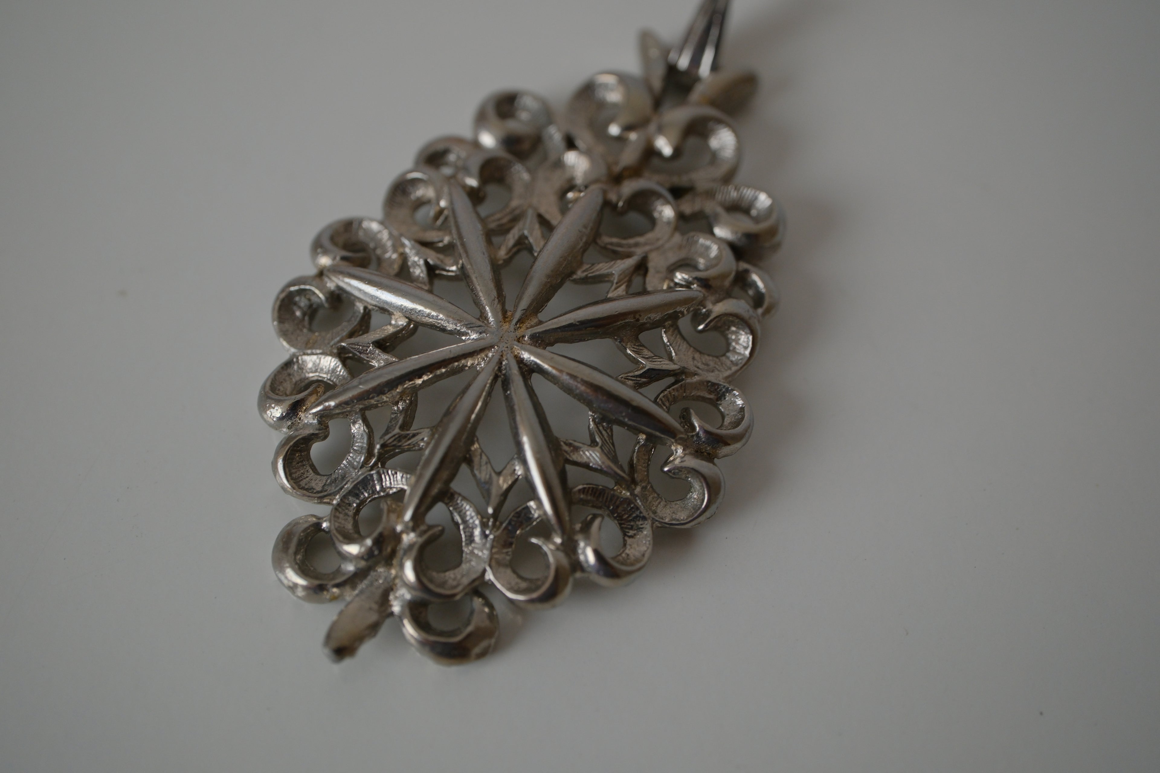 Intricate filigree openwork pendant