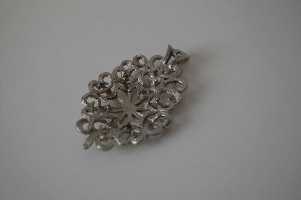 Intricate filigree openwork pendant