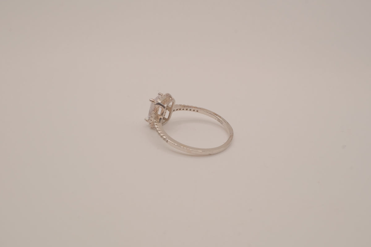 Vintage Sterling silver emerald-cut halo ring