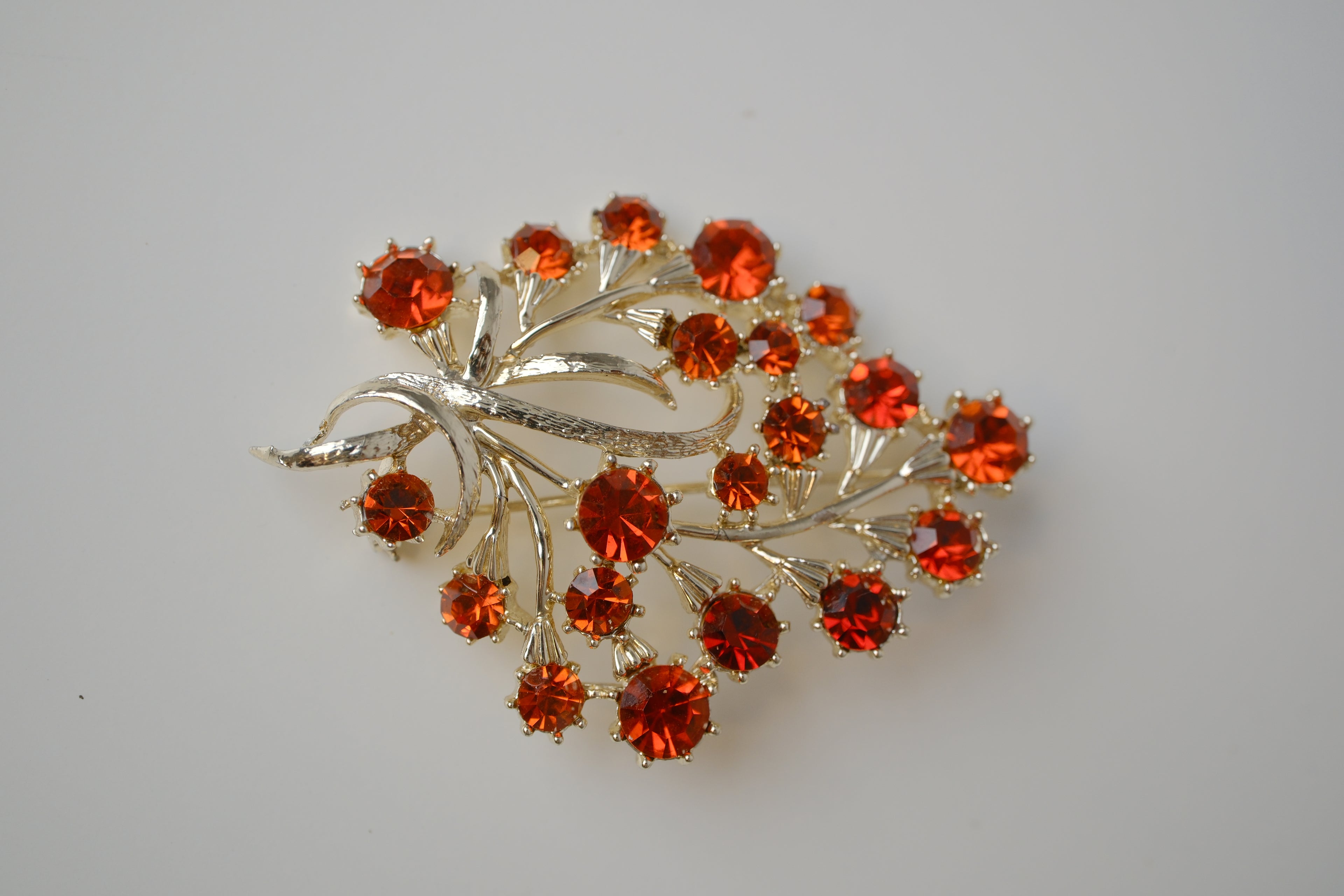 Vintage Coro floral Orange rhinestone brooch