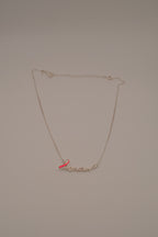 Avon Breast Cancer Crusade "Love" Ribbon Necklace
