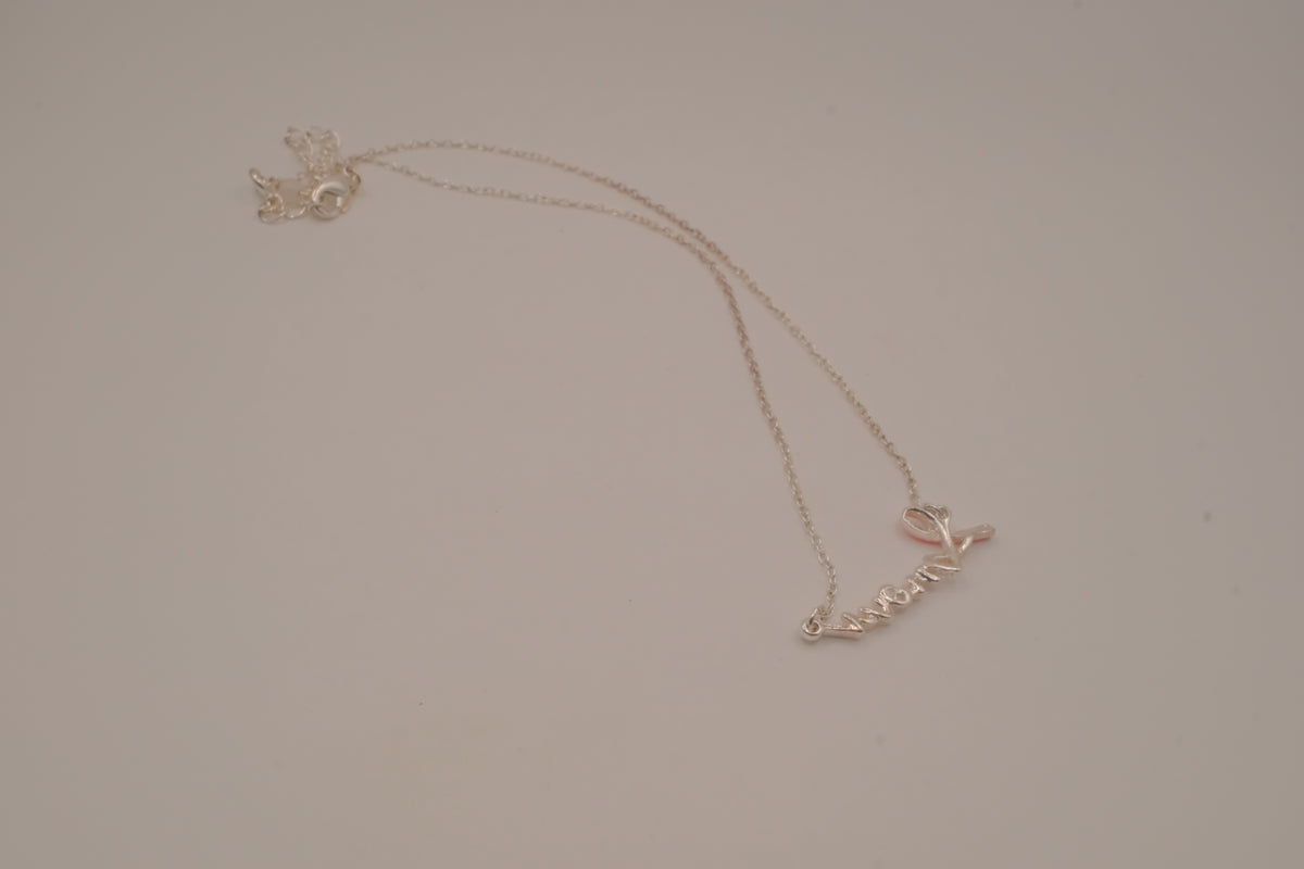 Avon Breast Cancer Crusade "Love" Ribbon Necklace