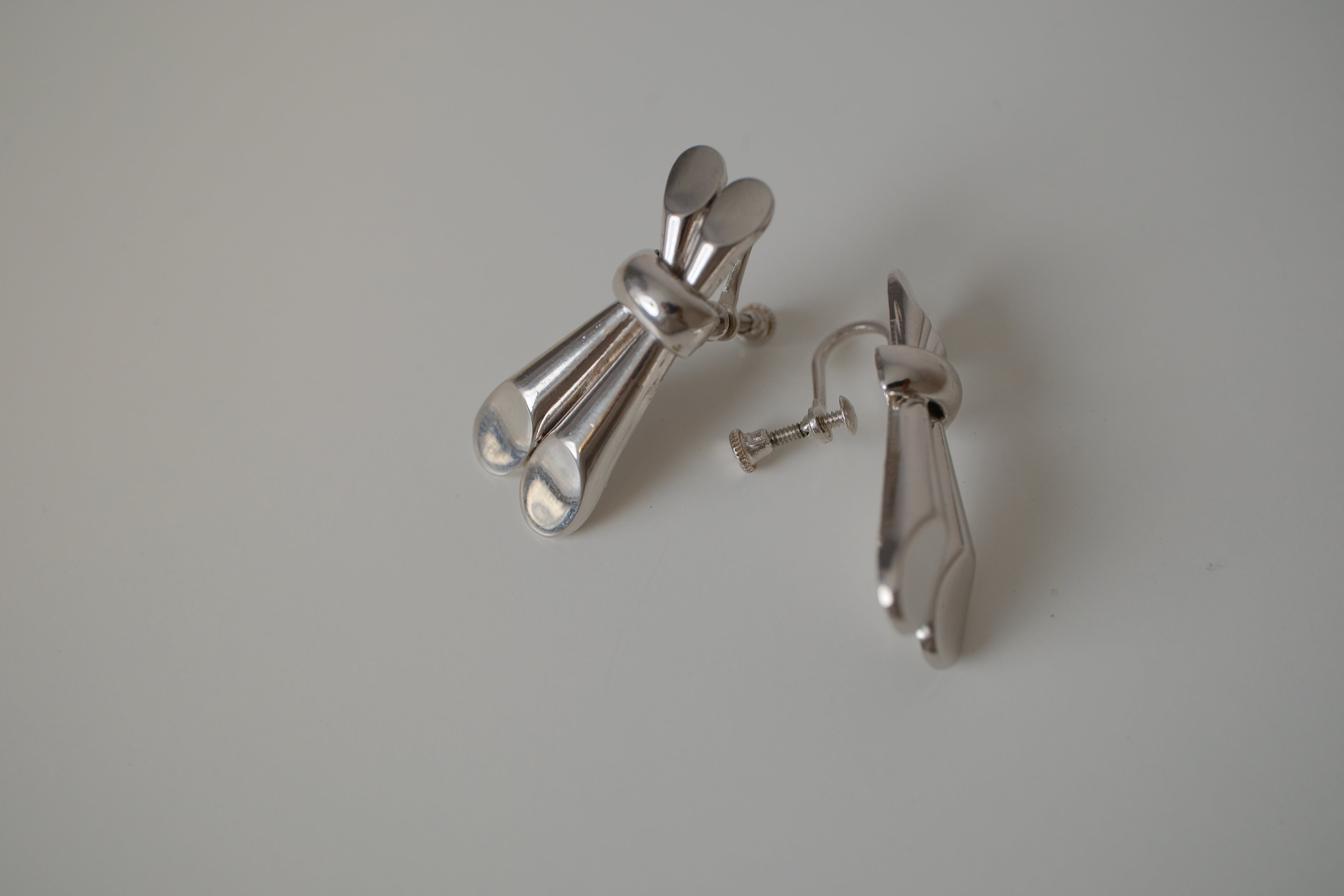 Vintage Coro Silver toned knot-design screw back earrings