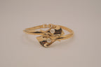Vintage Avon gold-tone calla lily hinged bangle bracelet