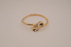 Vintage Avon gold-tone calla lily hinged bangle bracelet