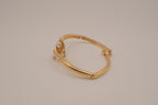Vintage Avon gold-tone calla lily hinged bangle bracelet