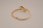 Vintage Avon gold-tone calla lily hinged bangle bracelet