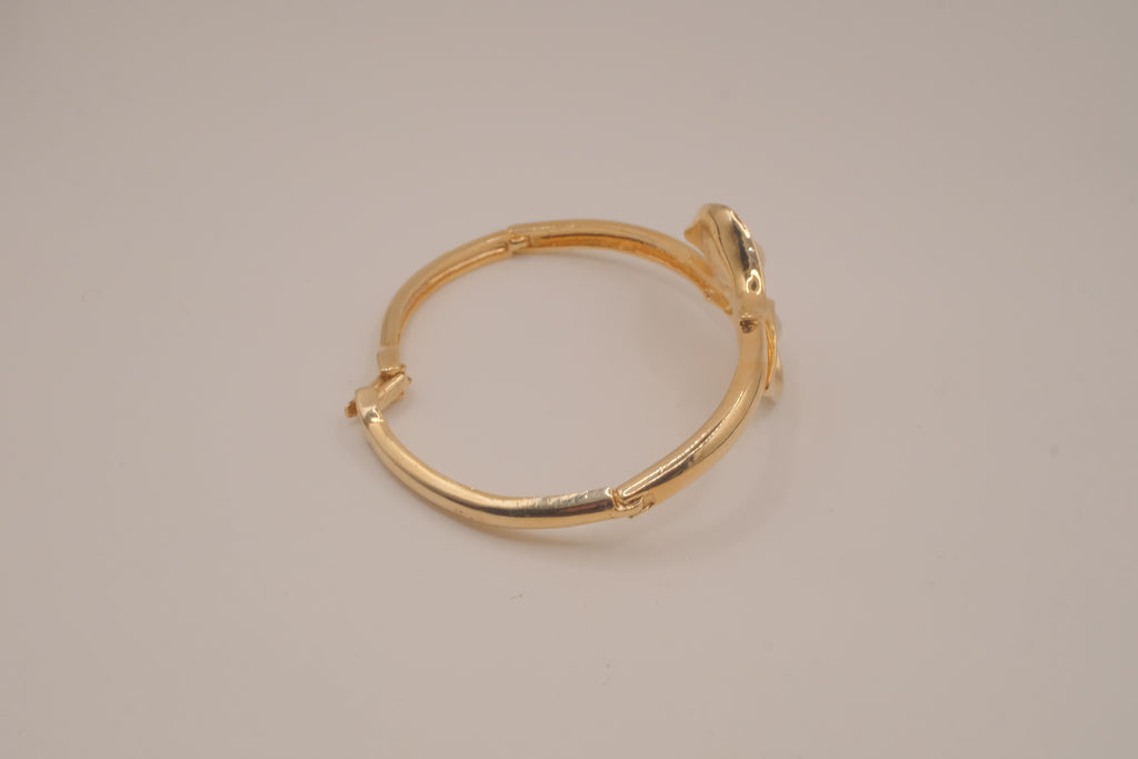 Vintage Avon gold-tone calla lily hinged bangle bracelet