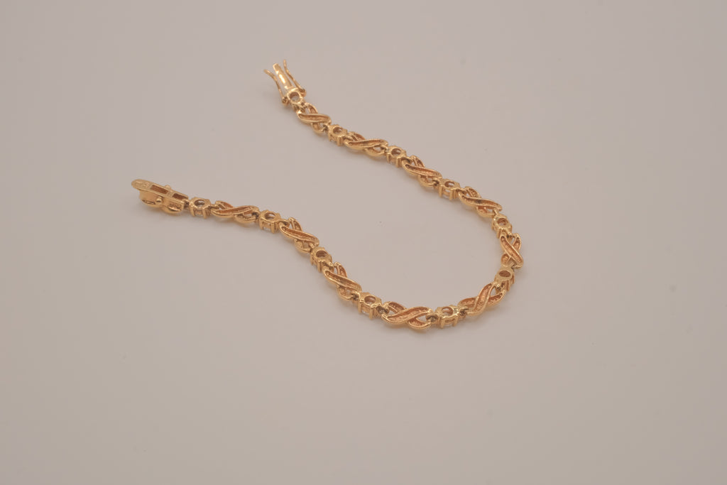 Vintage gold vermeil XO tennis bracelet