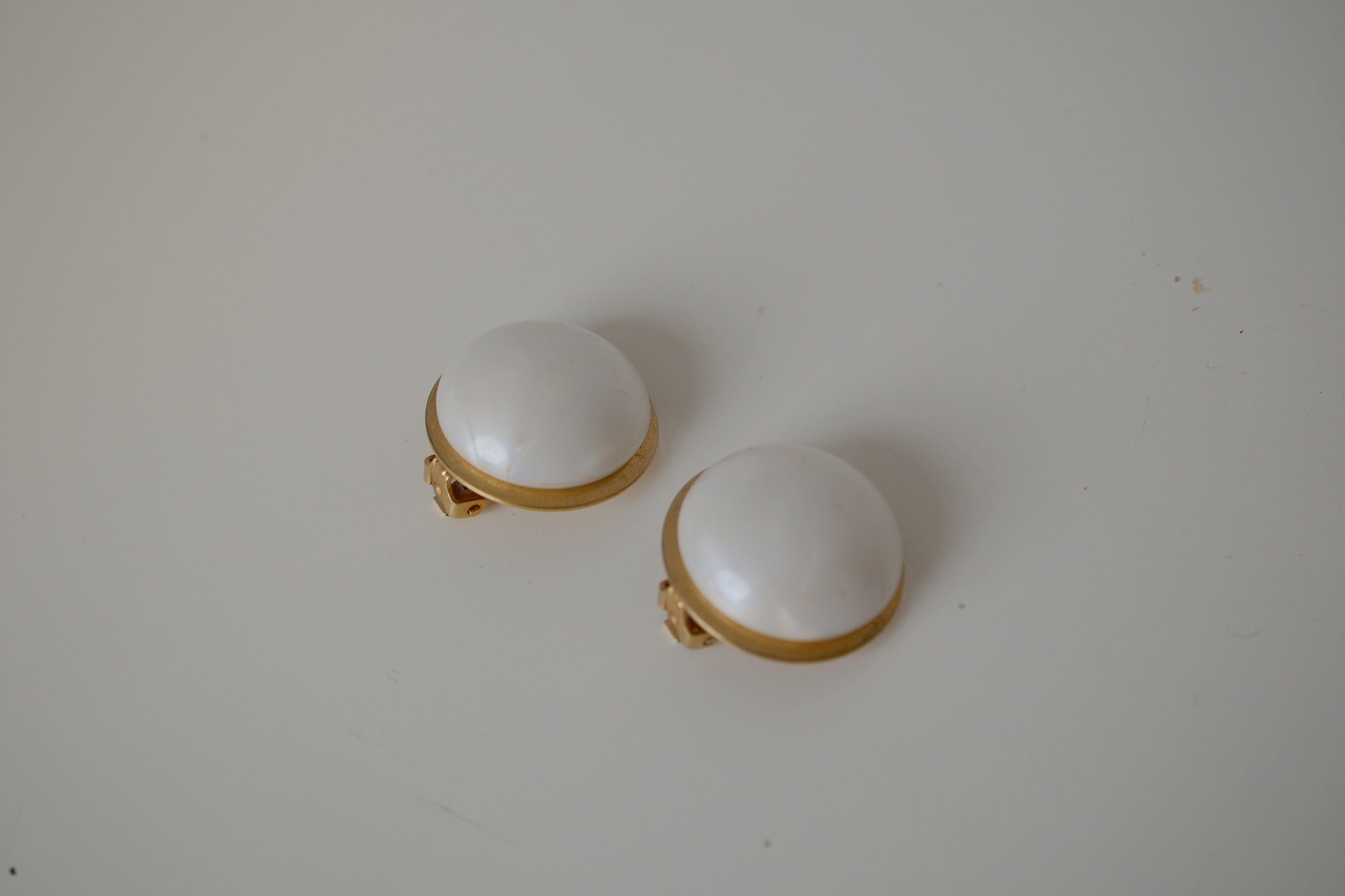 Vintage Coro white cabochon clip-on earrings