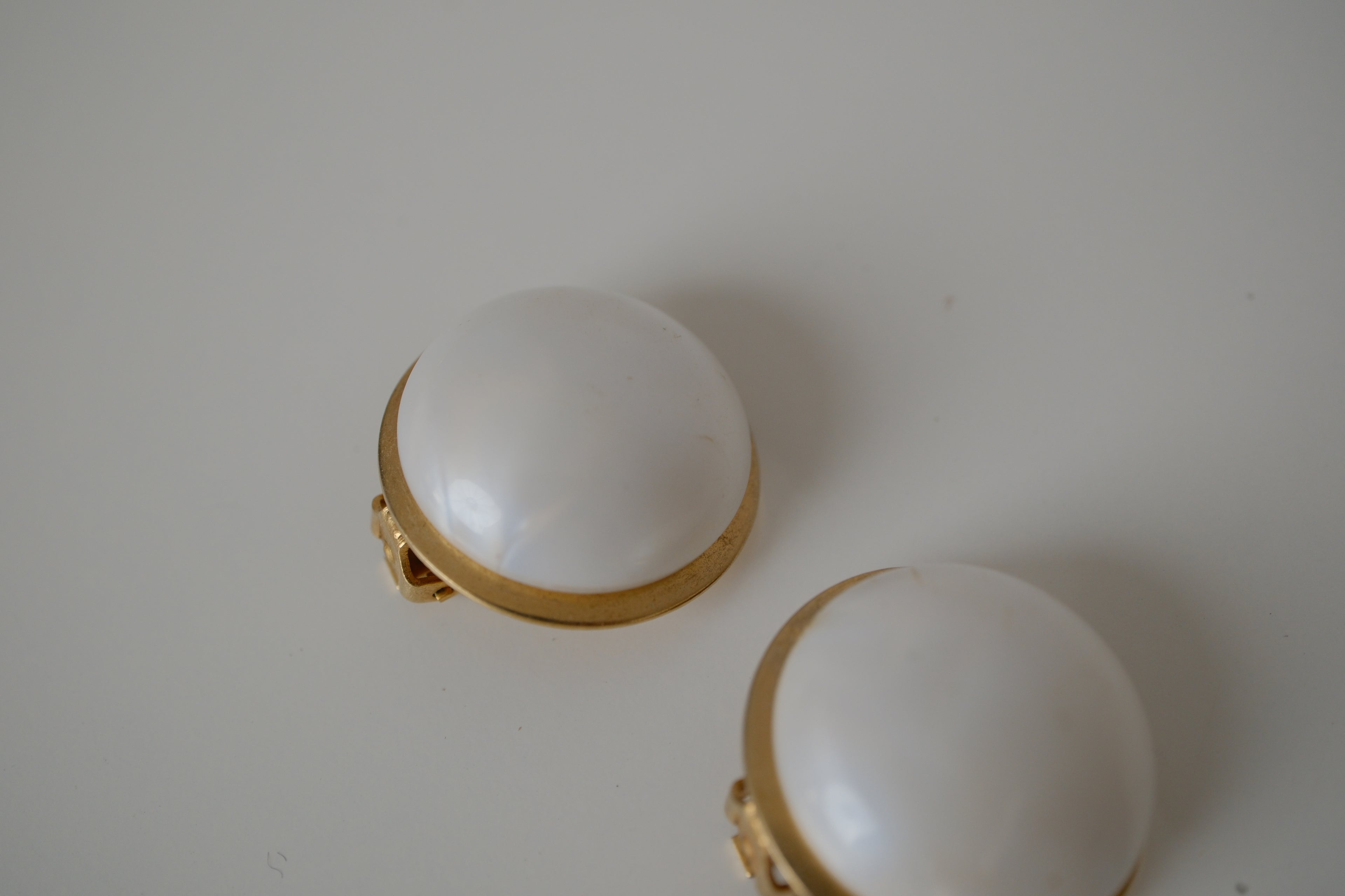 Vintage Coro white cabochon clip-on earrings