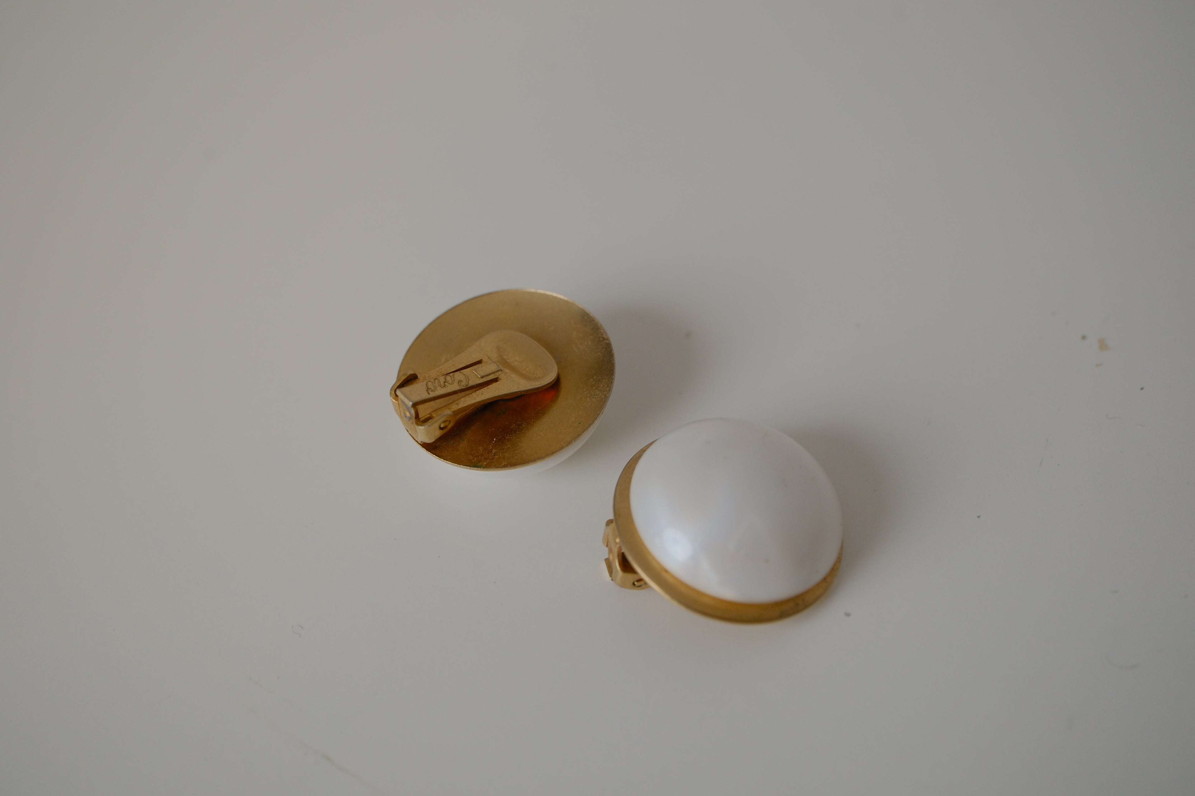 Vintage Coro white cabochon clip-on earrings
