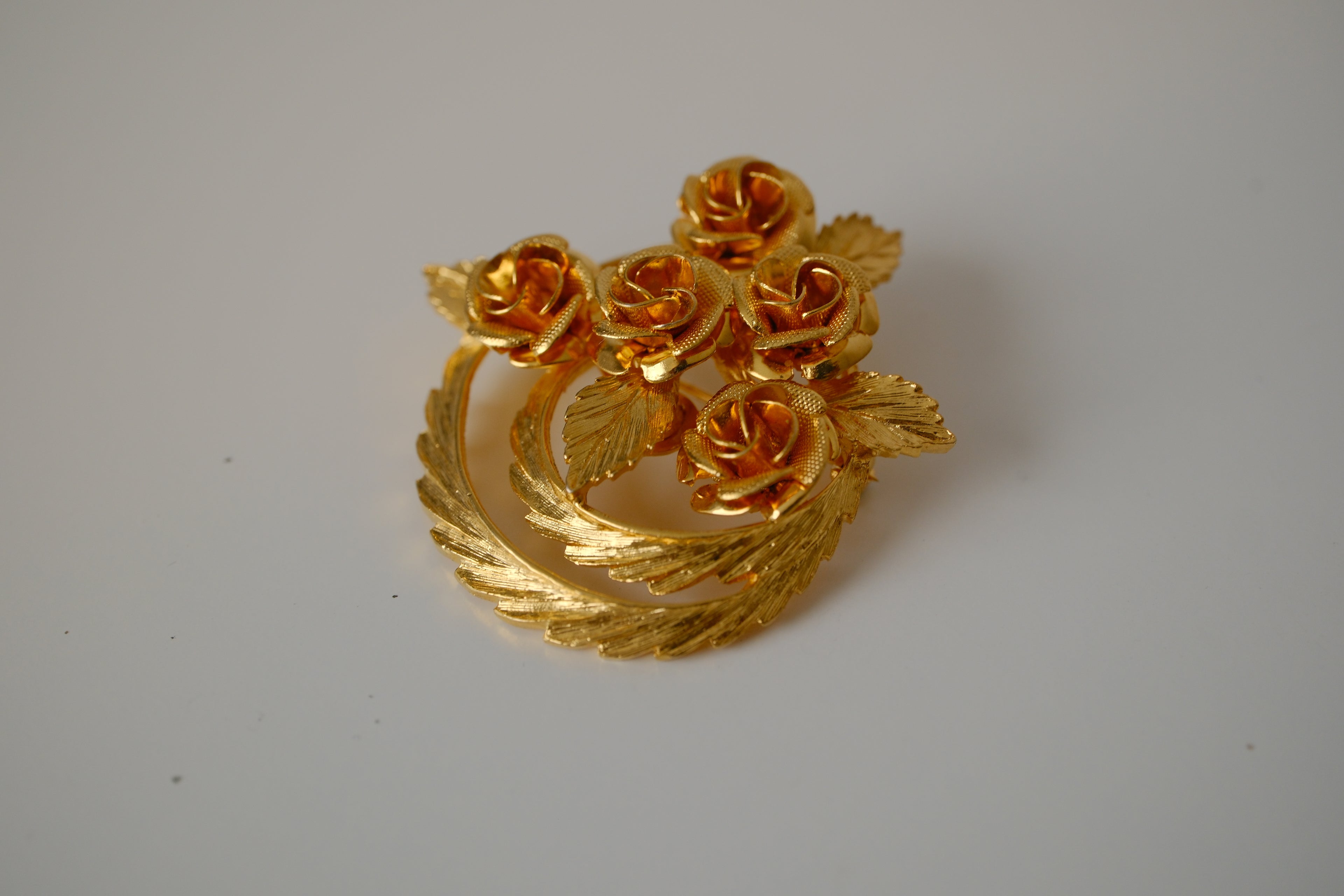 Vintage Coro gold-tone flower brooch