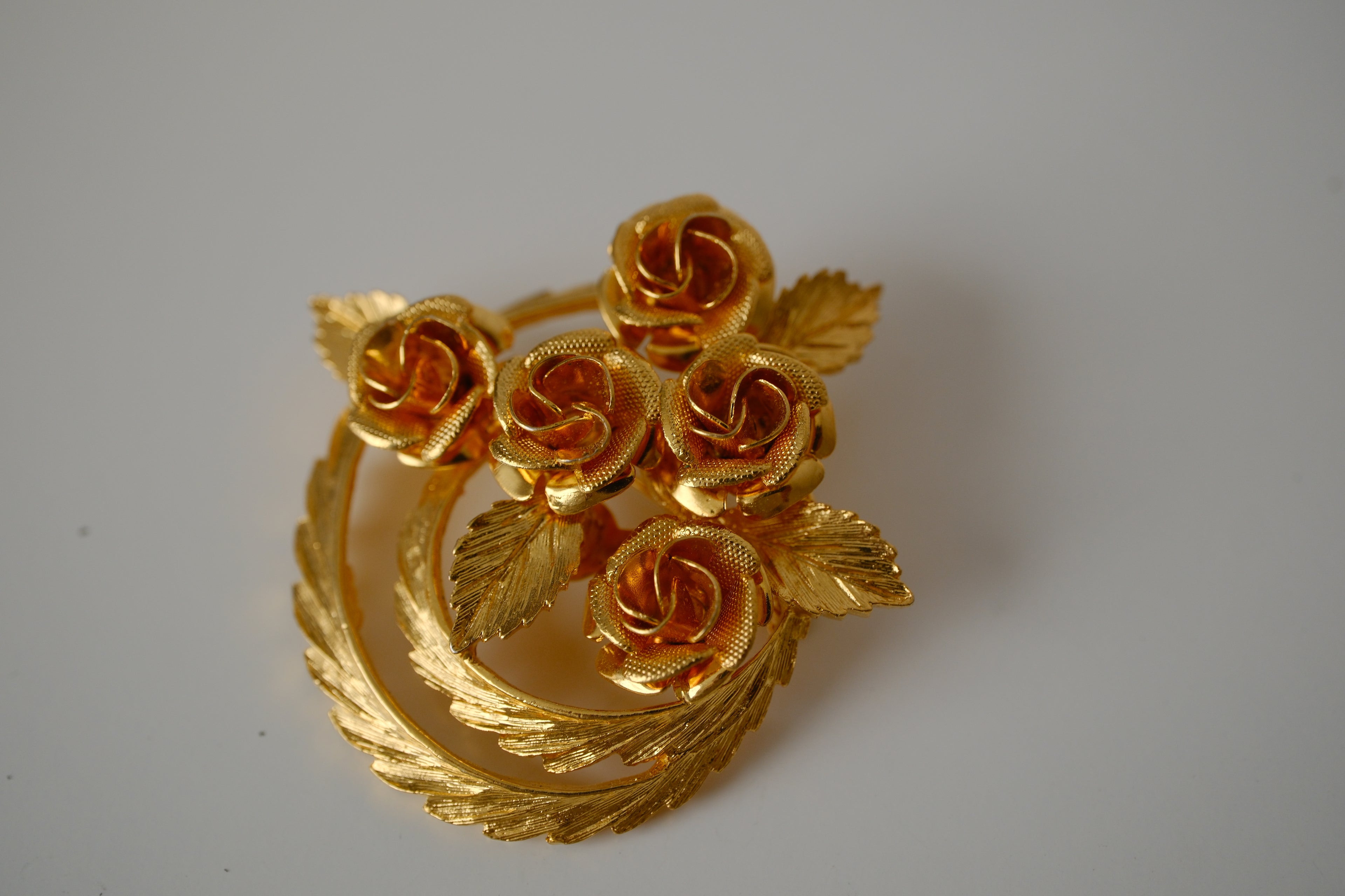 Vintage Coro gold-tone flower brooch