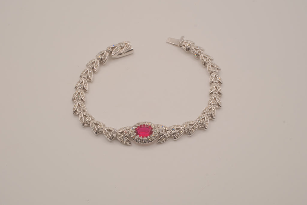 Oval-cut red stone tennis bracelet