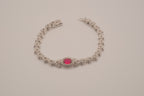 Oval-cut red stone tennis bracelet