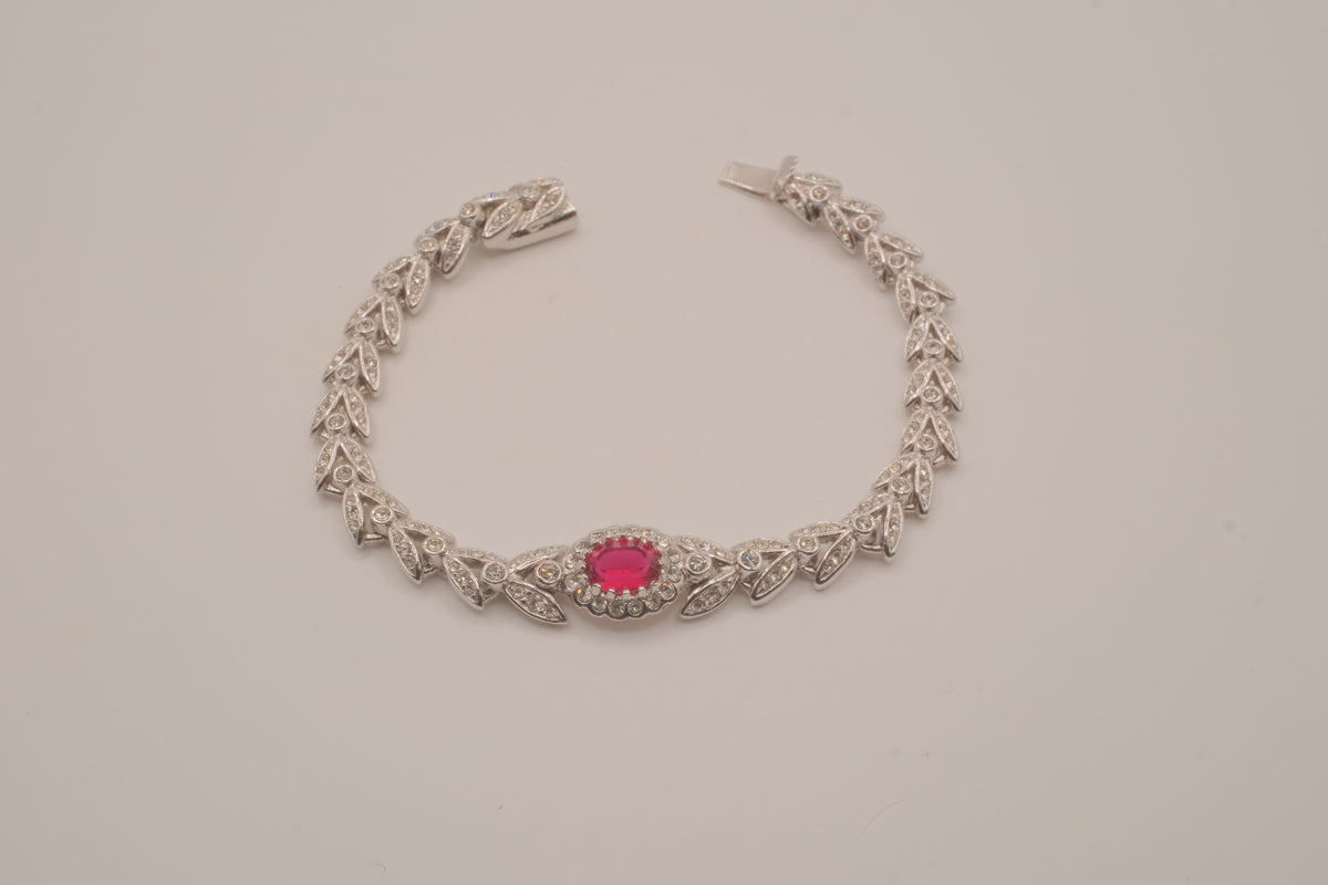 Oval-cut red stone tennis bracelet