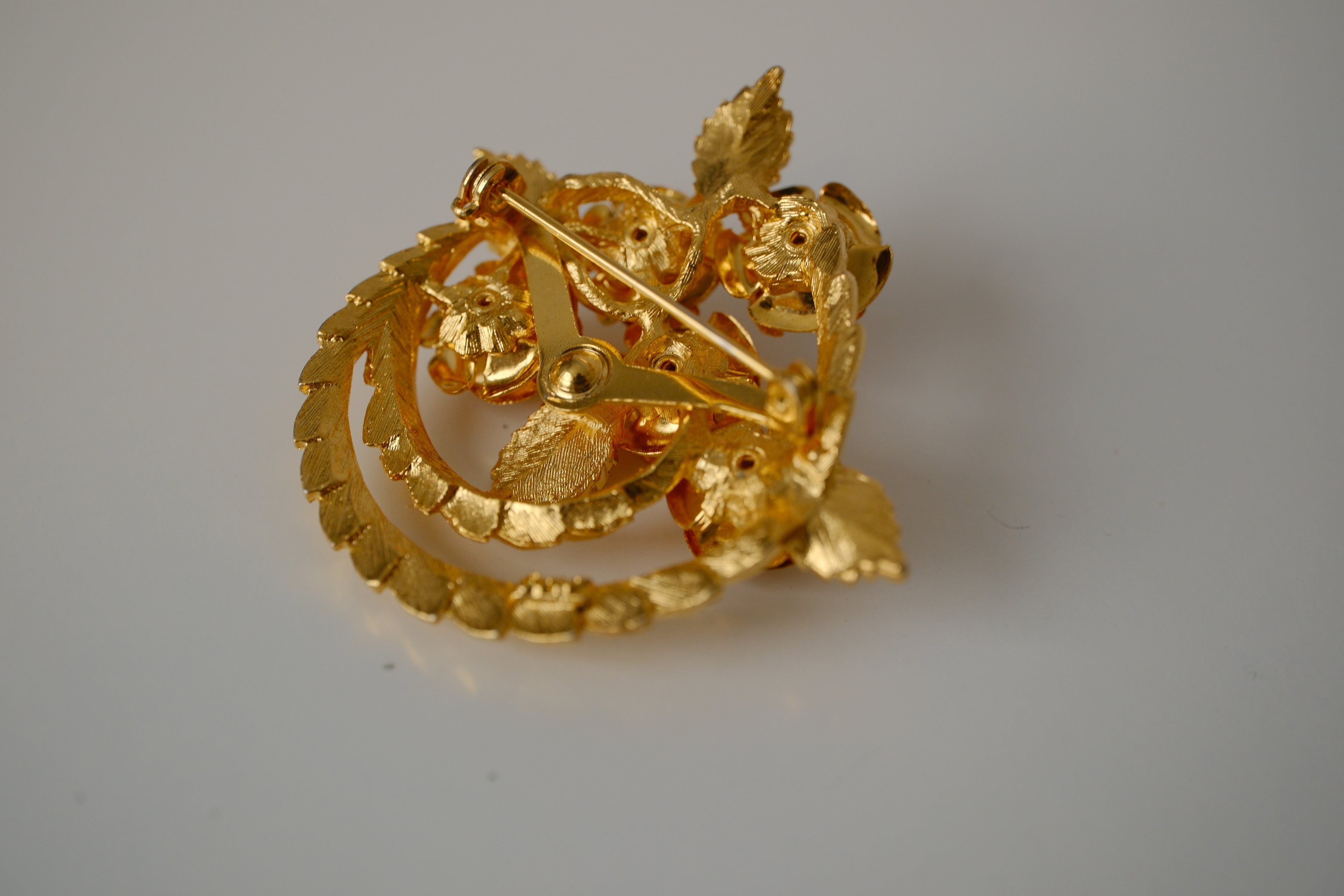 Vintage Coro gold-tone flower brooch