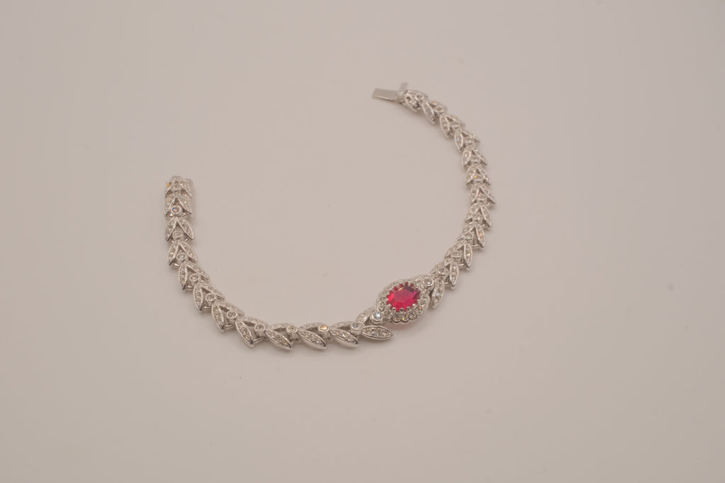 Oval-cut red stone tennis bracelet