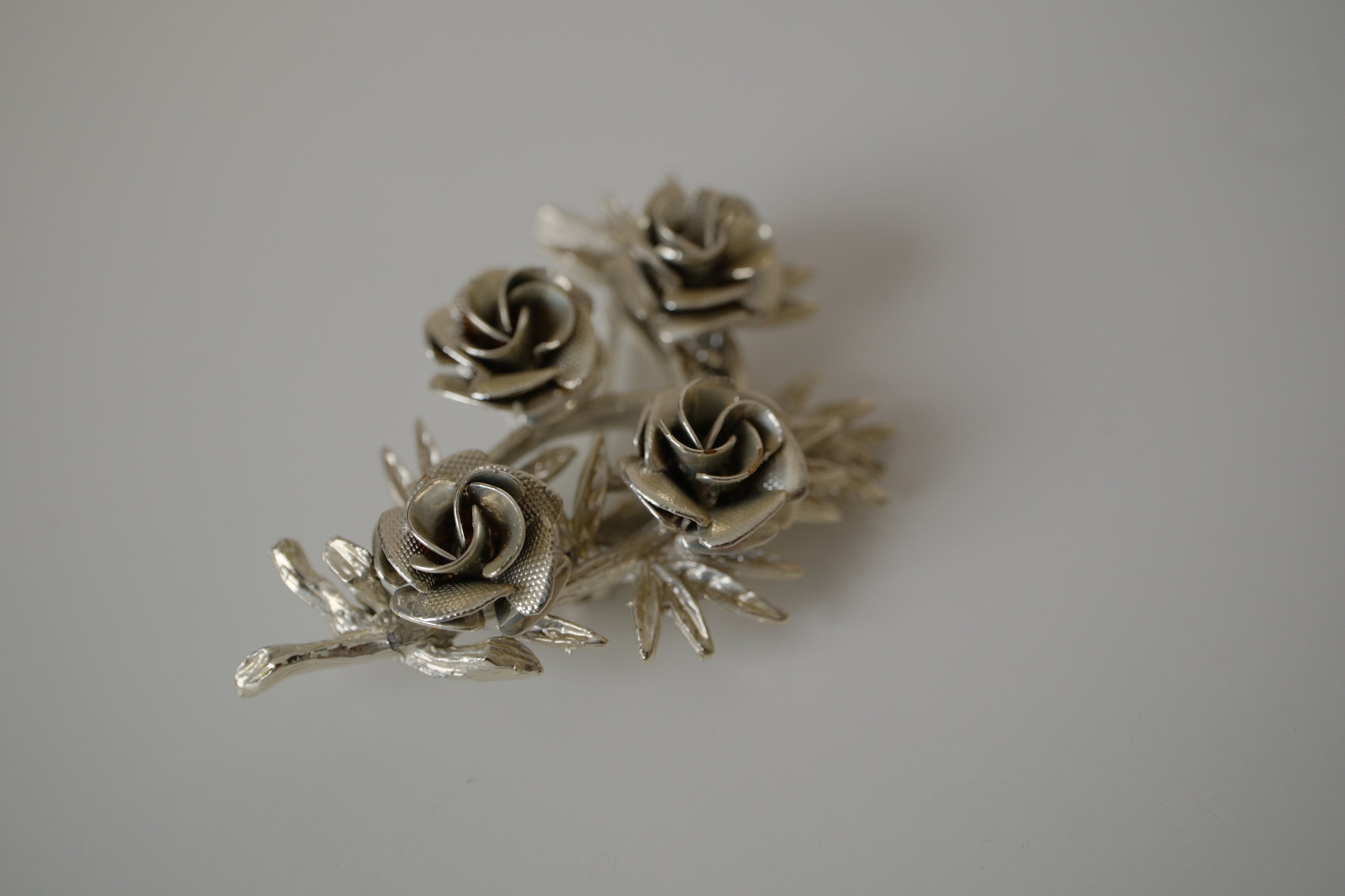 Vintage Coro silver-tone rose bouquet brooch